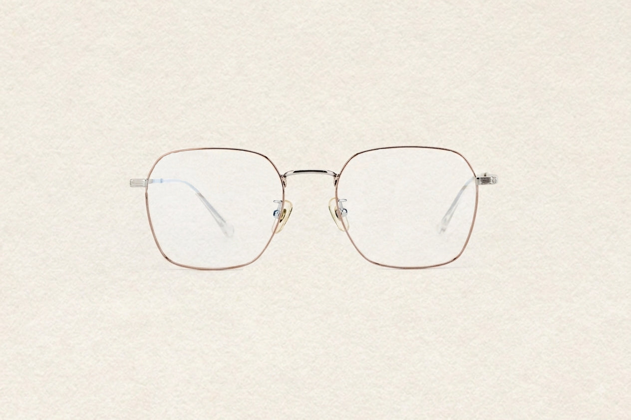 V2630 square metal eyeglasses thin rose gold wire geometric square optical frame on neutral textured background front view
